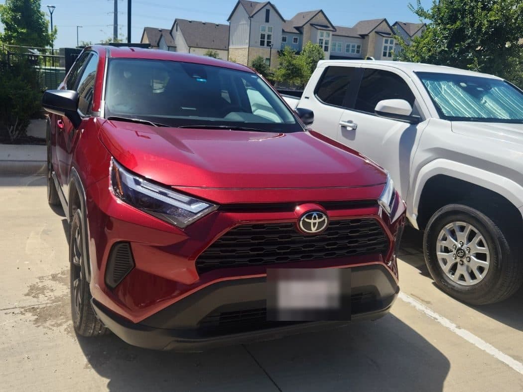 A red SUV from the Echo rental fleet